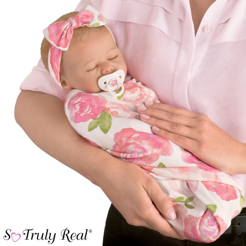 baby doll with blanket
