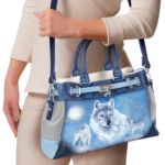 Guardians Of The Wild Womens Light Gray Poly Twill Designer-Style Shoulder Tote  Bag With Faux Leather Trim Featuring Wolf Art By Artist Eddie LePage