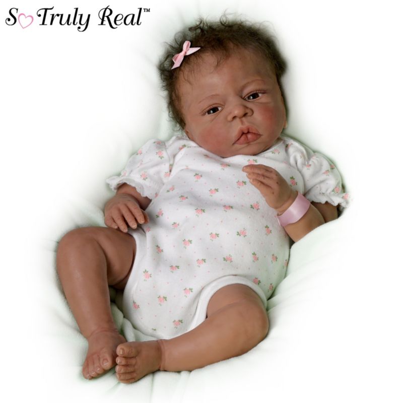 newborn baby doll with hospital bracelet